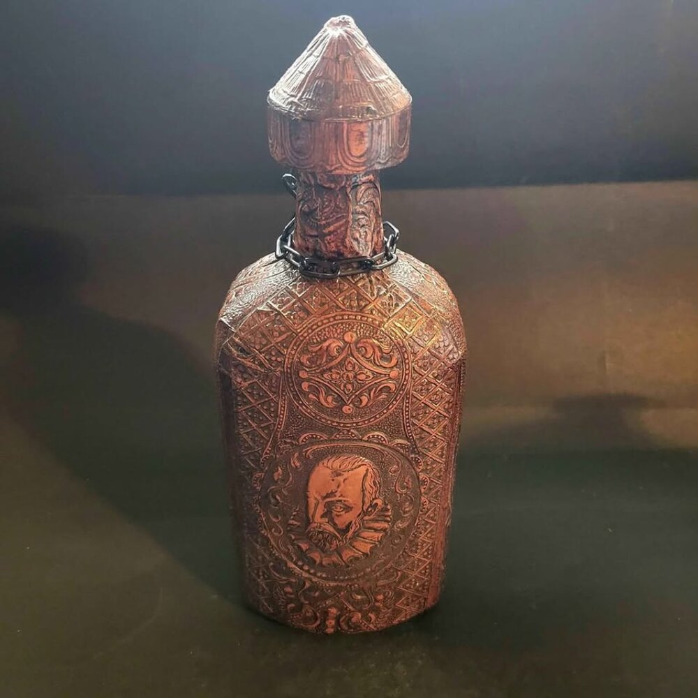 Vintage, Embossed Leather-Wrap Decanter With A Portrait Of Miguel de Cervantes